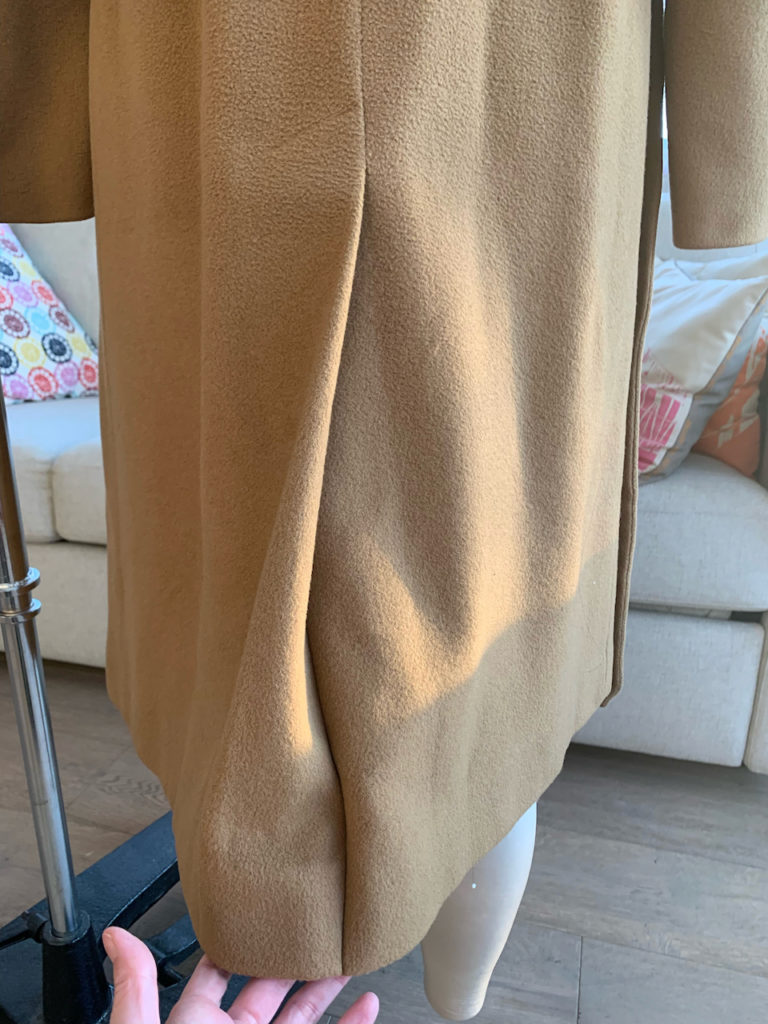 Sewn together kick pleat